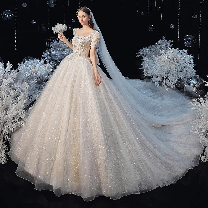 Robe De Mariage Princess Wedding Dress Sequins Vestido De Novia Short Sleeve Luxury Big Bow Star Yarn Ball Gown Wedding Dresses
Robe De Mariage Princess Wedding Dress Sequins Vestido De Novia Short Sleeve Luxury Big Bow Star Yarn Ball Gown Wedding Dresses