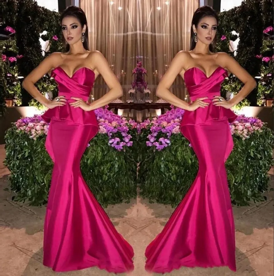 2025 Charming Fuchsia Satin Mermaid Long Evening Dresses Arabic Sweetheart Ruched Peplum Floor Length Formal Prom Dress Party
2025 Charming Fuchsia Satin Mermaid Long Evening Dresses Arabic Sweetheart Ruched Peplum Floor Length Formal Prom Dress Party