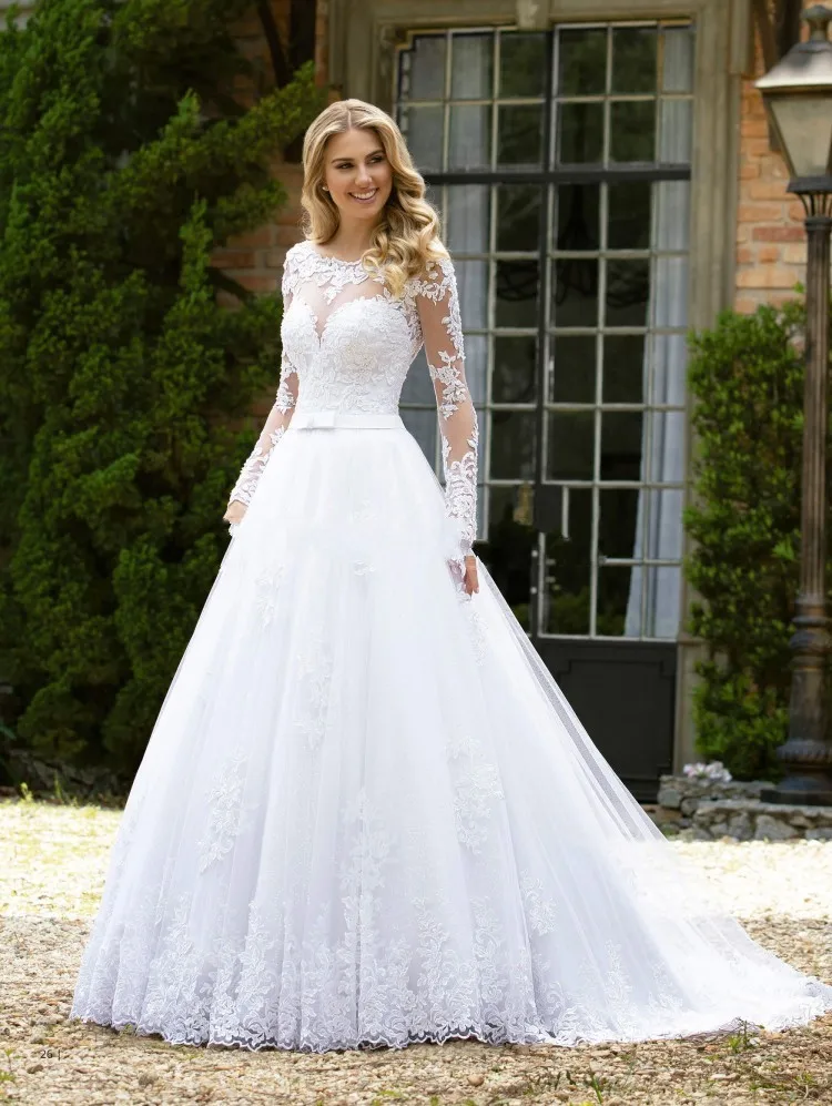 2020 Luxury Lace Applique A Line Long Sleeve Wedding Dresses Sexy Backless Scoop Neck Floor Length White Bridal Gowns with Bow
2020 Luxury Lace Applique A Line Long Sleeve Wedding Dresses Sexy Backless Scoop Neck Floor Length White Bridal Gowns with Bow