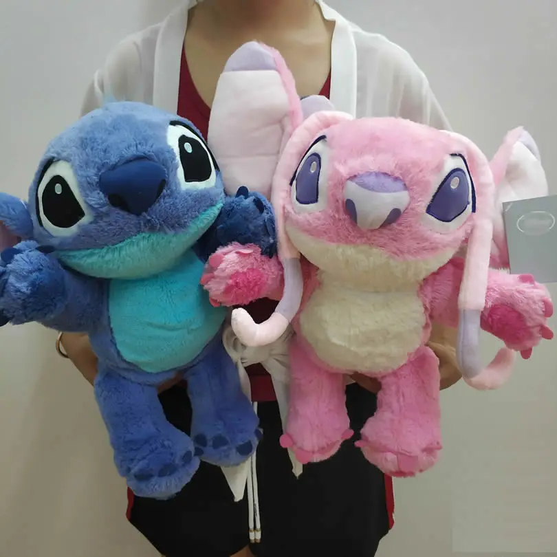 Free Shipping 36cm 14'' Lilo And Stitch Plush Toys Stitch #626 And Angel #624 Stuffed Soft doll For Gift good quality
Free Shipping 36cm 14'' Lilo And Stitch Plush Toys Stitch #626 And Angel #624 Stuffed Soft doll For Gift good quality