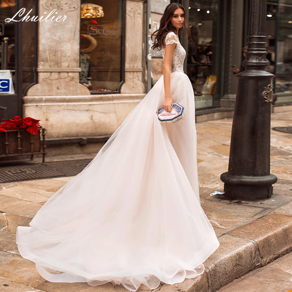 Lhuilier Customized Mermaid Lace Wedding Dresses O Neck Short Sleeves Appliques Beaded Bridal Dress with Detachable Train
Lhuilier Customized Mermaid Lace Wedding Dresses O Neck Short Sleeves Appliques Beaded Bridal Dress with Detachable Train