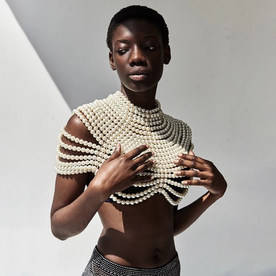 2020 Sexy Fashion Festival Hollow Halter Metal Stitching Pure Pearl Halter Neck Sexy Girl Halloween Party Pearl Top
2020 Sexy Fashion Festival Hollow Halter Metal Stitching Pure Pearl Halter Neck Sexy Girl Halloween Party Pearl Top