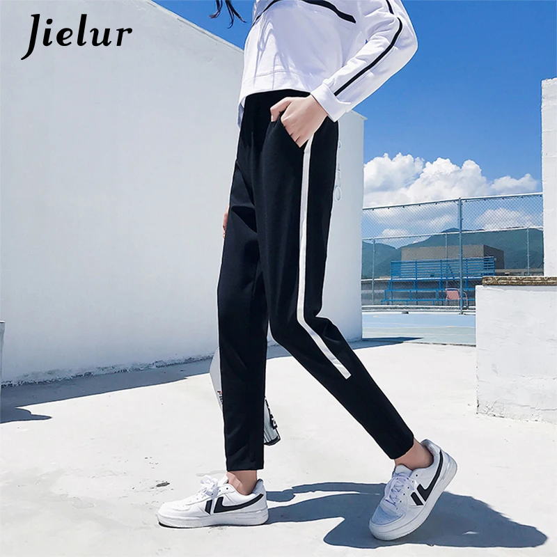 Jielur Black Sweatpants Female Leisure Side-striped Sports Trousers M-XXL Loose Streetwear Harem Pants for Women Outfit Fall
Jielur Black Sweatpants Female Leisure Side-striped Sports Trousers M-XXL Loose Streetwear Harem Pants for Women Outfit Fall