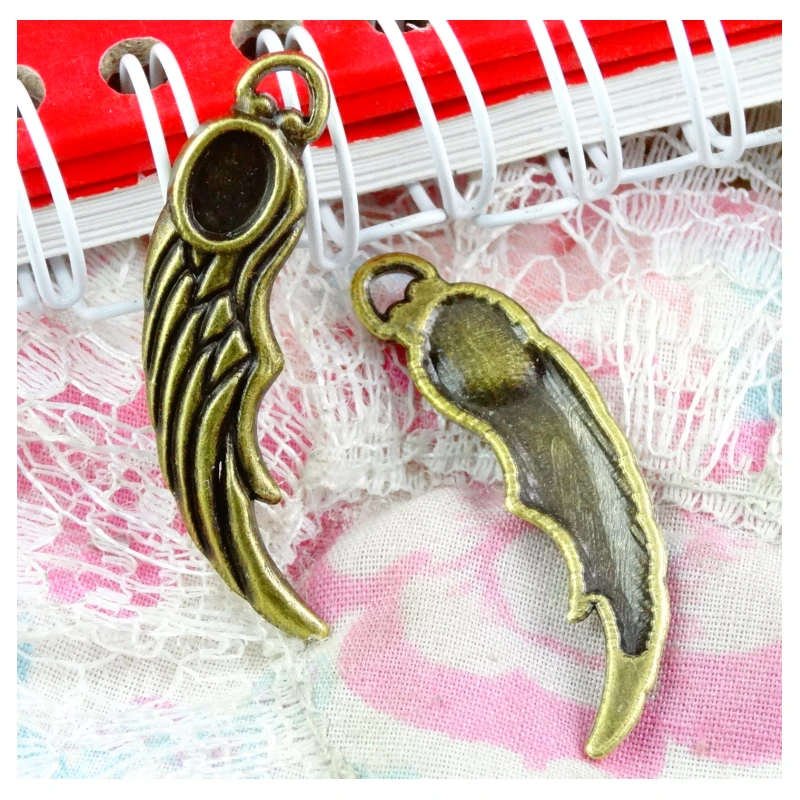 50pcs 11.2*36.2MM Wings Pendant Vintage Antique Bronze Plated Charms DIY Handmade Accessories
50pcs 11.2*36.2MM Wings Pendant Vintage Antique Bronze Plated Charms DIY Handmade Accessories
