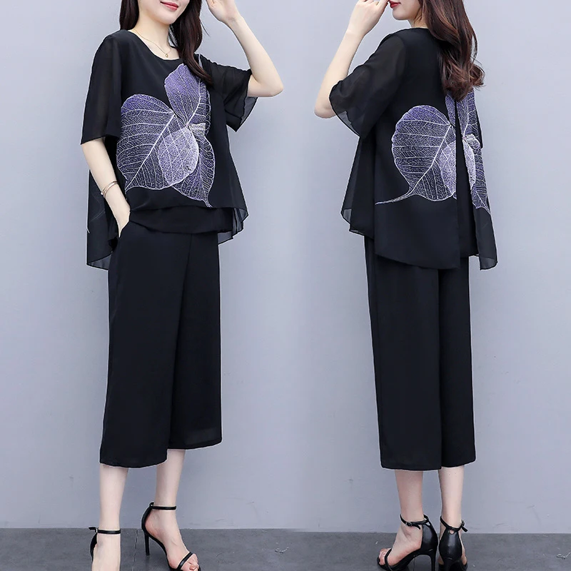 2022 summer women's Clothing solid color suit fashion tulle round neck top + elastic waist cropped trousers two-piece female 26
2022 summer women's Clothing solid color suit fashion tulle round neck top + elastic waist cropped trousers two-piece female 26