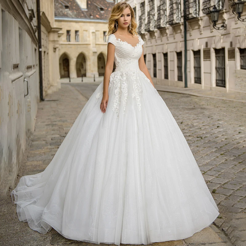 Scoop Appliques Lace Cap Sleeve Buttons A-Line Tulle Wedding Dress Bridal Gowns Vestido De Noiva
Scoop Appliques Lace Cap Sleeve Buttons A-Line Tulle Wedding Dress Bridal Gowns Vestido De Noiva