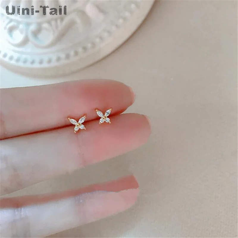 Uini-Tail hot new 925 Tibetan silver butterfly stud earrings trend of simple, small and sweet micro-studded student earrings
Uini-Tail hot new 925 Tibetan silver butterfly stud earrings trend of simple, small and sweet micro-studded student earrings