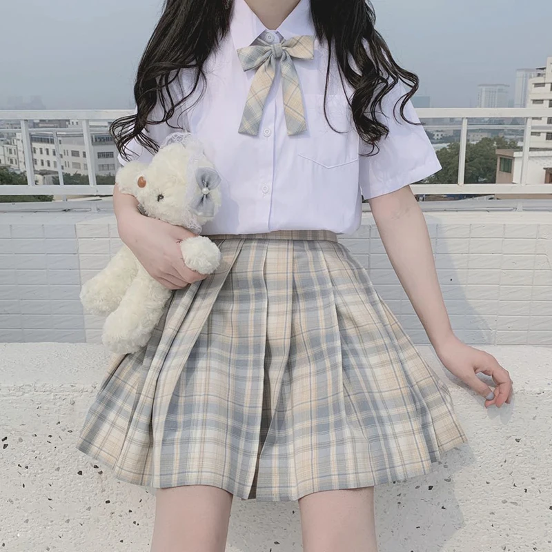 Japanese Bow Tie College Wind Short Sleeve Students White Shirt + High-Waisted Vintage Plaid Pleated Skirt Suit Female Summer
Japanese Bow Tie College Wind Short Sleeve Students White Shirt + High-Waisted Vintage Plaid Pleated Skirt Suit Female Summer