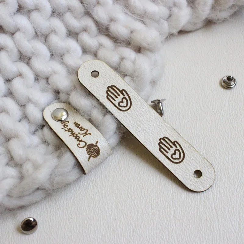 30pcs Leather labels with rivets for knitting clothes Personalized logo tags for handmade items Sewing hat Garment label folding
30pcs Leather labels with rivets for knitting clothes Personalized logo tags for handmade items Sewing hat Garment label folding