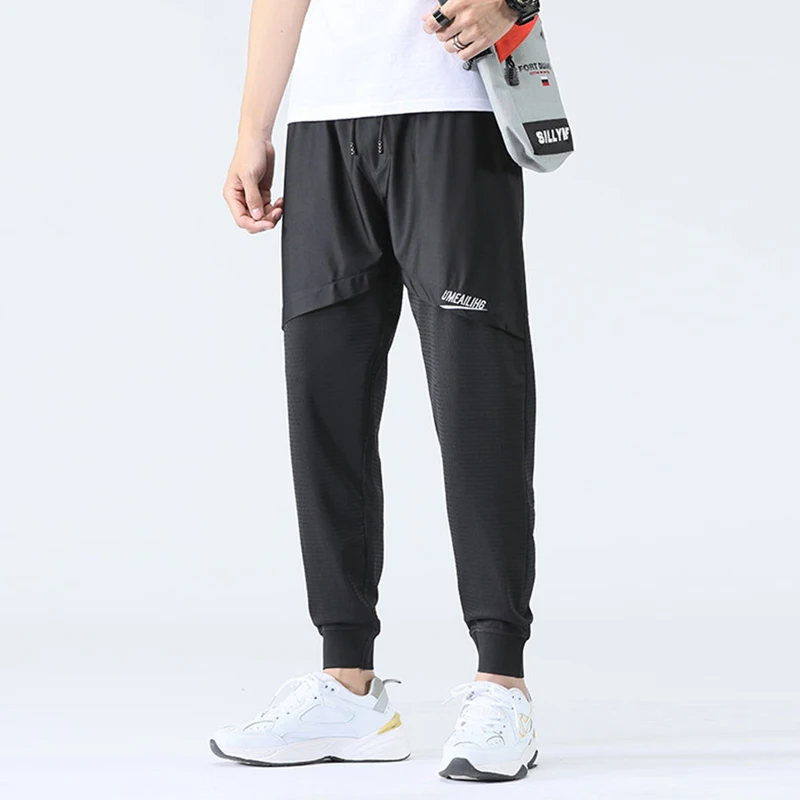 Summer ice silk stretch nine-point casual pants men's mesh harem beam pants sports air-conditioning trousers
Summer ice silk stretch nine-point casual pants men's mesh harem beam pants sports air-conditioning trousers