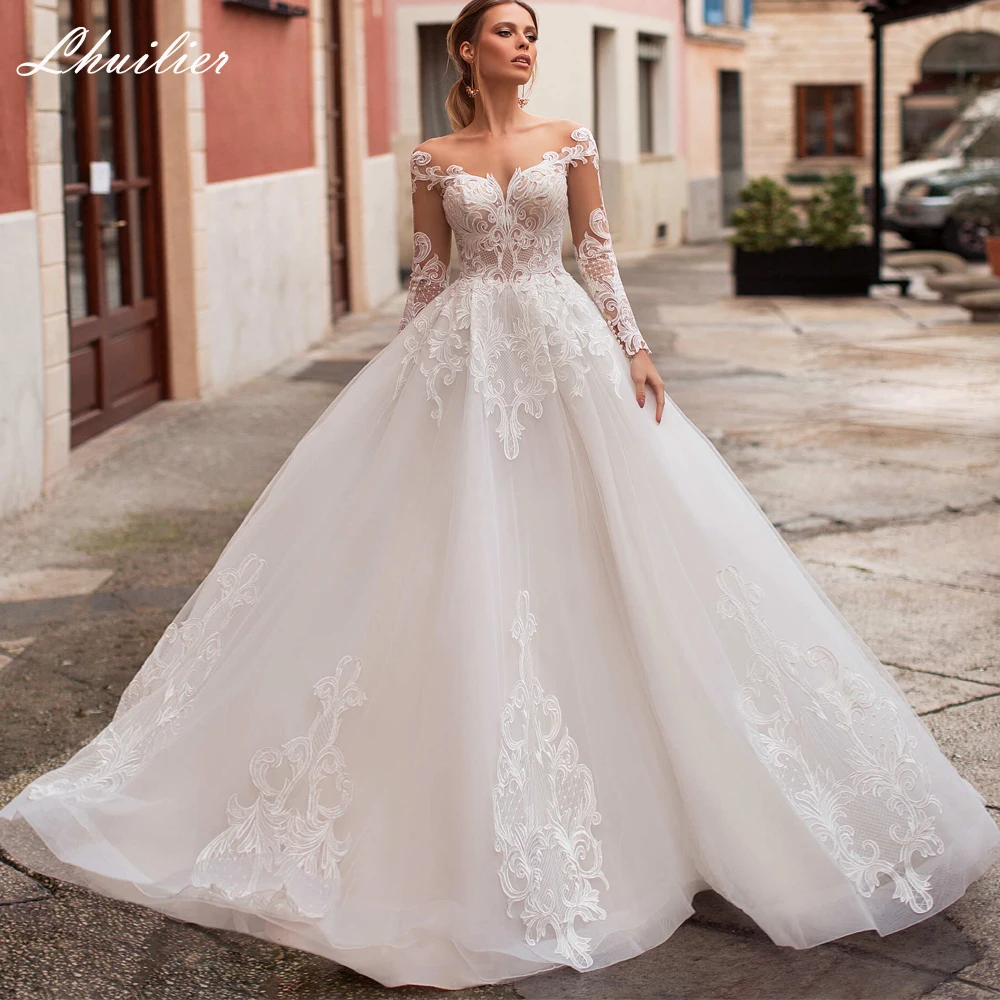 Lhuilier Customized Ball Gown Wedding Dresses Long Sleeves Lace Floor Length Illusion Bridal Dress with Court Train
Lhuilier Customized Ball Gown Wedding Dresses Long Sleeves Lace Floor Length Illusion Bridal Dress with Court Train