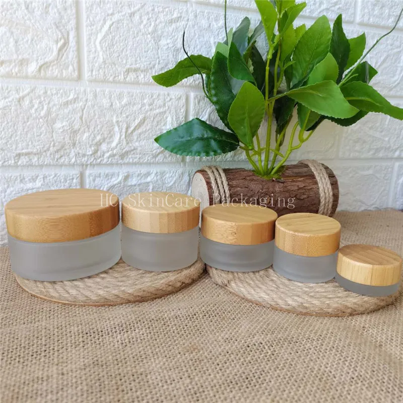 OEM ODM engraved printing logo Cosmetic 5ml 15ml 30ml 50ml 100ml clear frosted glass jar with bamboo wooden lid for body cream
OEM ODM engraved printing logo Cosmetic 5ml 15ml 30ml 50ml 100ml clear frosted glass jar with bamboo wooden lid for body cream