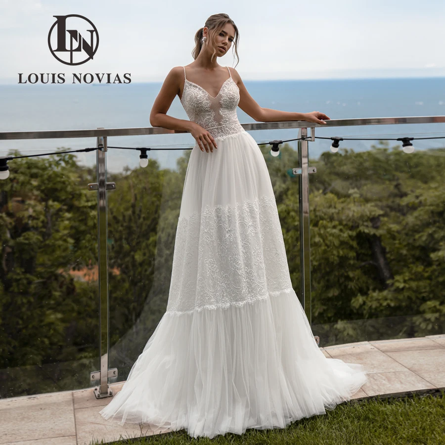 LOUIS NOVIAS Свадебное платье трапециевидной формы, легкое свадебное платье в стиле бохо с вышивкой на бретельках и бисером, Vestidos De Novia
LOUIS NOVIAS Свадебное платье трапециевидной формы, легкое свадебное платье в стиле бохо с вышивкой на бретельках и бисером, Vestidos De Novia
