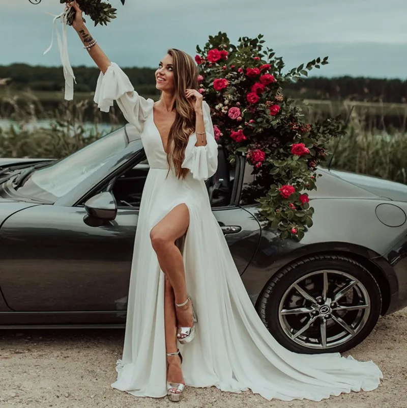 New Beach Wedding Dresses Boho Long Sleeve Bridal Gowns 2021 Slit V-Neck Backless Bohemian Bride Dress Vestidos De Mairee
New Beach Wedding Dresses Boho Long Sleeve Bridal Gowns 2021 Slit V-Neck Backless Bohemian Bride Dress Vestidos De Mairee