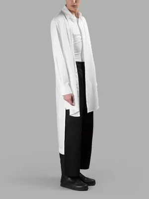 Spring and summer men and women in the same style in the long before short after long shirt personality shirt
Spring and summer men and women in the same style in the long before short after long shirt personality shirt