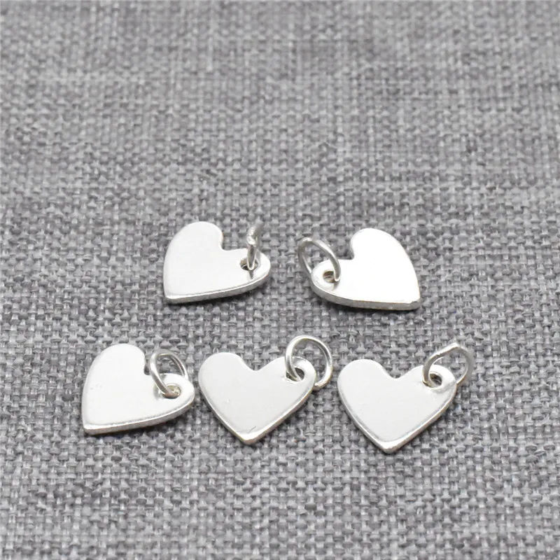 10 Pieces of 925 Sterling Silver Love Heart Tag Charms 2-sided for Valentines Bracelet Necklace
10 Pieces of 925 Sterling Silver Love Heart Tag Charms 2-sided for Valentines Bracelet Necklace