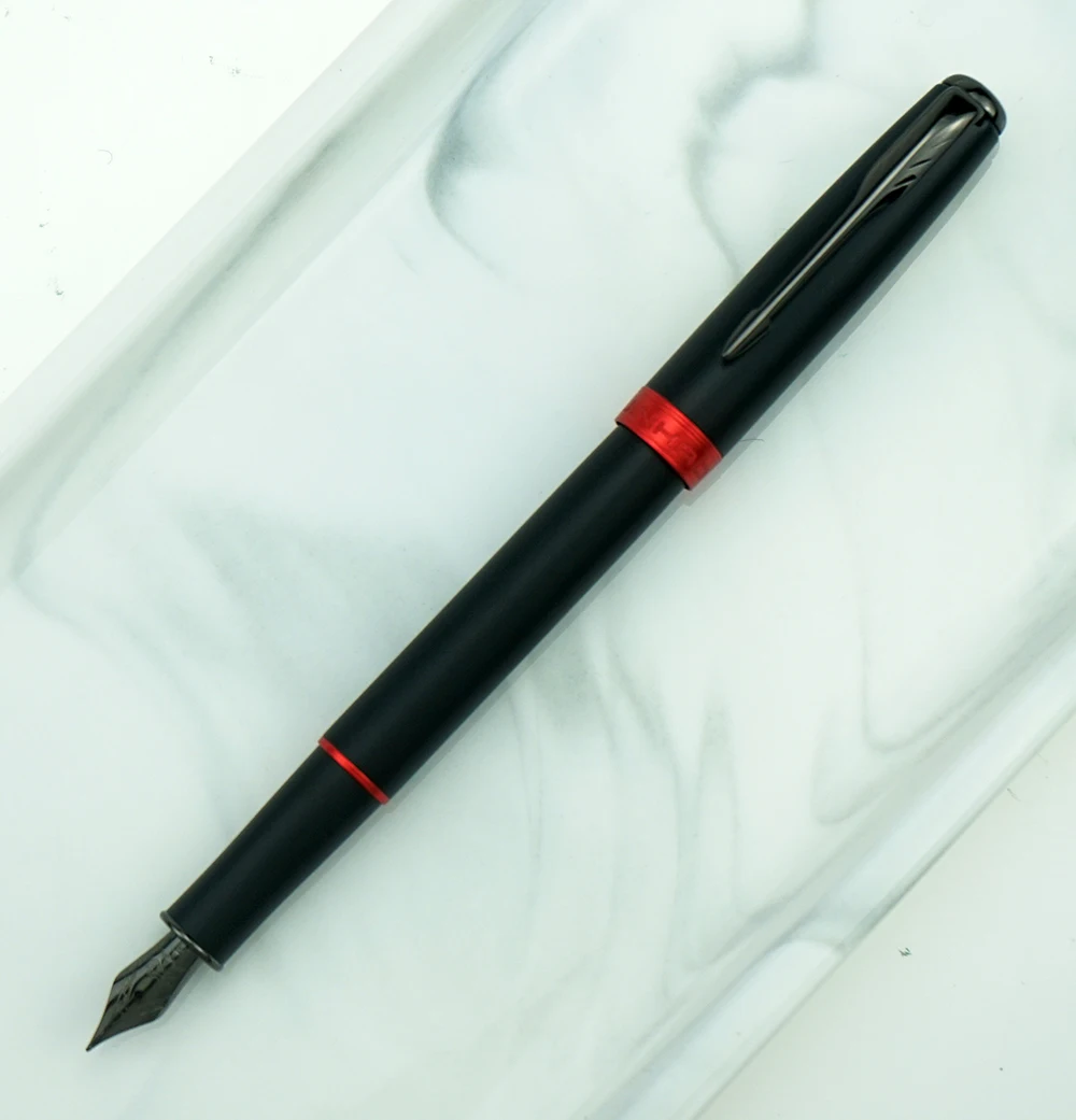 Ручка перьевая Jinhao 75 матовая черная металлическая, черная перьевая ручка 0,5 мм с красным кольцом/полностью черная с преобразователем, чернильная ручка для офиса, делового подарка
Ручка перьевая Jinhao 75 матовая черная металлическая, черная перьевая ручка 0,5 мм с красным кольцом/полностью черная с преобразователем, чернильная ручка для офиса, делового подарка