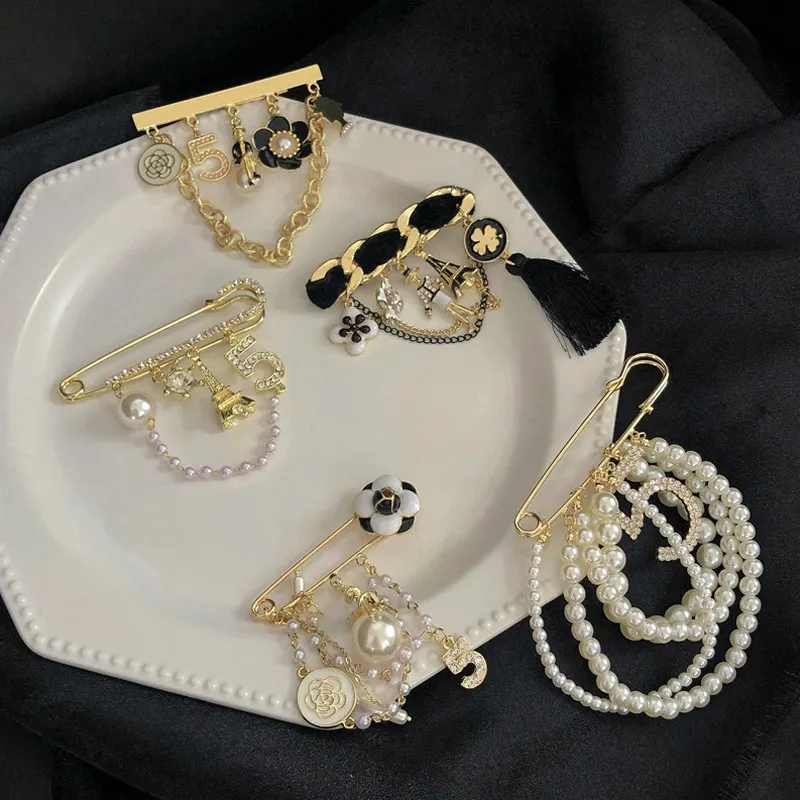Luxury pearl tassel Camellia number 5 brooch fashion suit early autumn coat decoration corsage Brooches accessories
Luxury pearl tassel Camellia number 5 brooch fashion suit early autumn coat decoration corsage Brooches accessories
