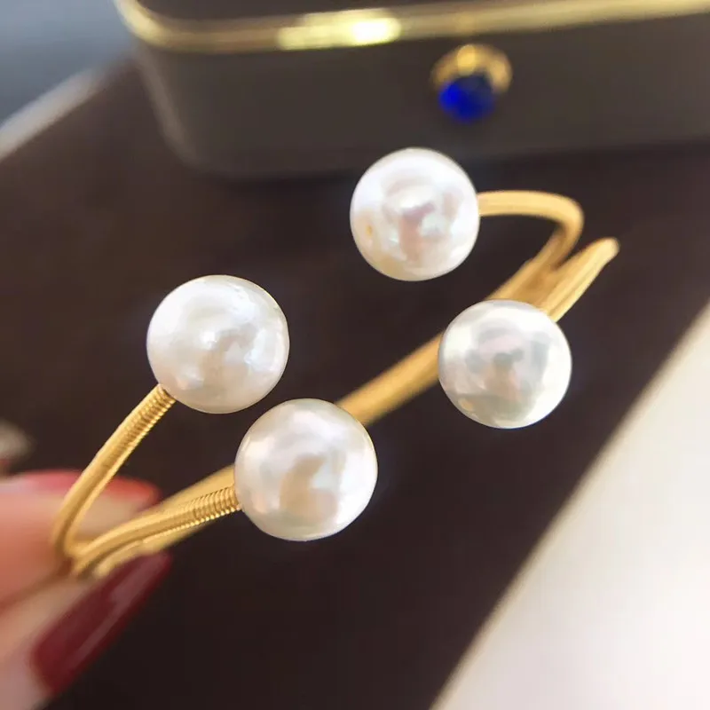 Free shipping special design 100% handmade women bracelet natural round white real pearl beads jewelry open adjustable length
Free shipping special design 100% handmade women bracelet natural round white real pearl beads jewelry open adjustable length
