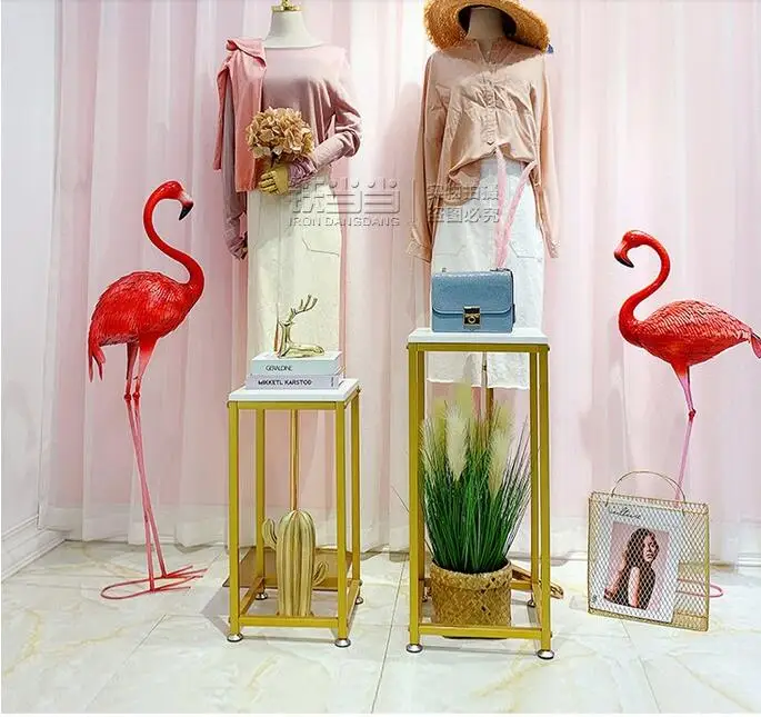 Clothing shop window glass display stand shoe bag stand decorative props display stand model props lady window display stand
Clothing shop window glass display stand shoe bag stand decorative props display stand model props lady window display stand