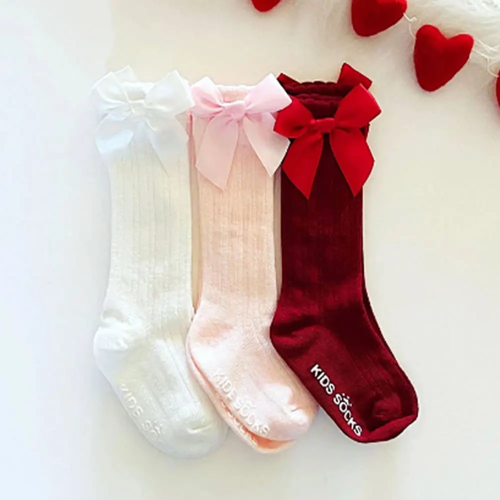 New winter girl socks children pure color bow cute baby girl socks Sweet bowknet knee high socks in the baby accesses
New winter girl socks children pure color bow cute baby girl socks Sweet bowknet knee high socks in the baby accesses