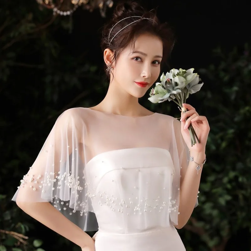Simple white with a long evening shawl covering cape large size white nail pearl elegant scarf
Simple white with a long evening shawl covering cape large size white nail pearl elegant scarf