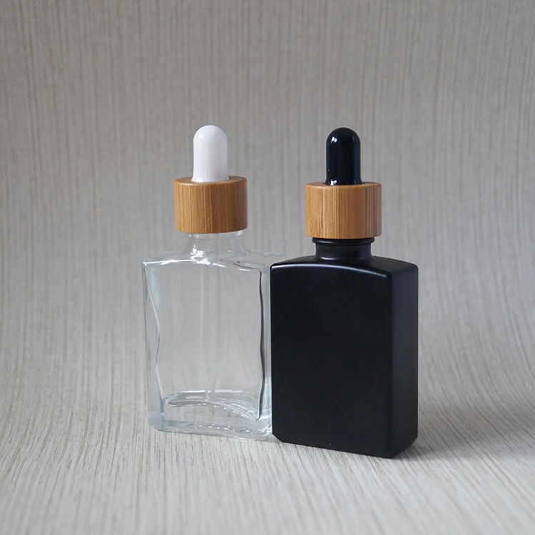 1oz bamboo beard oil 30ml rectangular hot stamping frosted black glass liquid dropper square bamboo lid bottle with wooden cap
1oz bamboo beard oil 30ml rectangular hot stamping frosted black glass liquid dropper square bamboo lid bottle with wooden cap