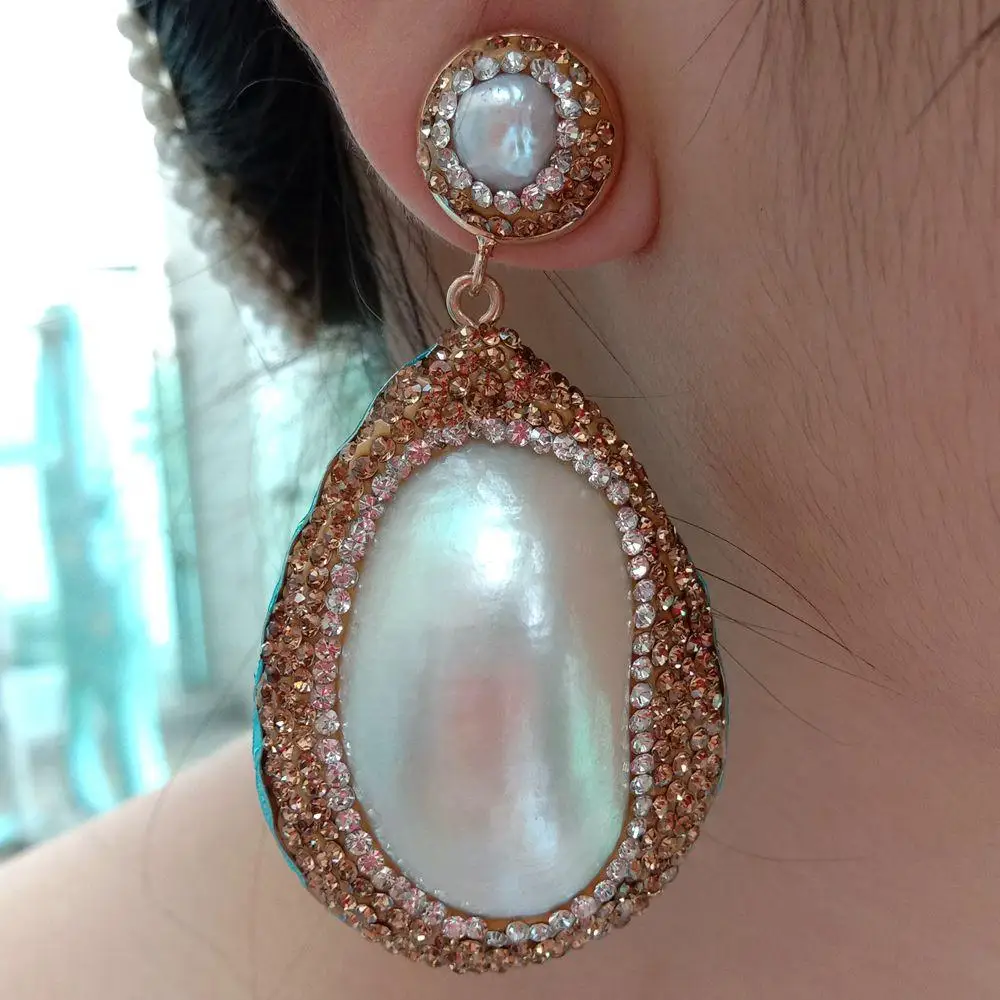 YYGEM 33x45MM White Mother Of Pearl Shell White Freshwater Pearl Stud Earrings cz pave Women Fashion Jewelry
YYGEM 33x45MM White Mother Of Pearl Shell White Freshwater Pearl Stud Earrings cz pave Women Fashion Jewelry
