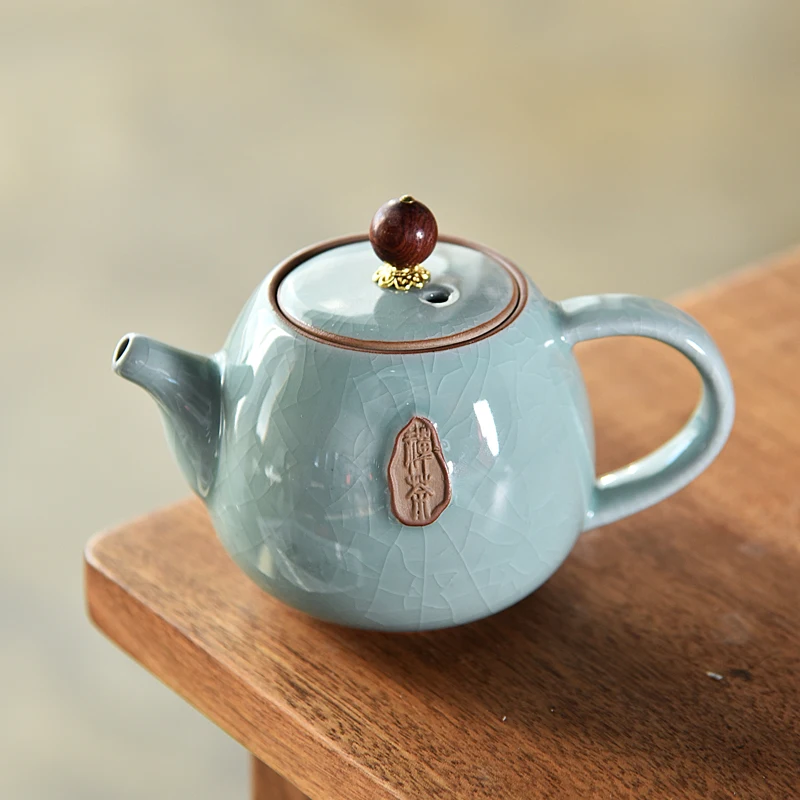 Celadon Crackle Glaze Teapots Traditional Chinese Tea Set Black Oolong Tea Kettle Ceramic Tea Pot Blooming Flower Tea Drinkware
Celadon Crackle Glaze Teapots Traditional Chinese Tea Set Black Oolong Tea Kettle Ceramic Tea Pot Blooming Flower Tea Drinkware