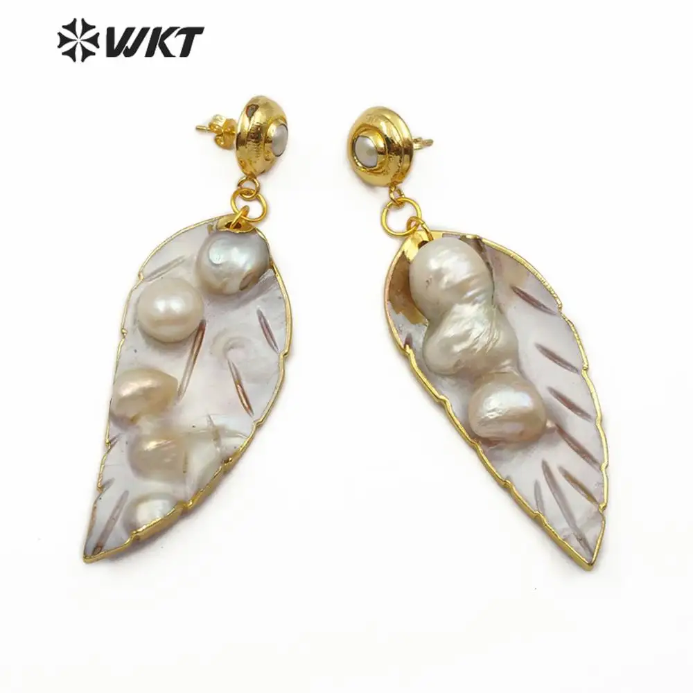 WT-E572 оптовые серьги из натурального перламутра с резной формой перьев и золотыми краями, модные женские ювелирные изделия из морской ракушки
WT-E572 оптовые серьги из натурального перламутра с резной формой перьев и золотыми краями, модные женские ювелирные изделия из морской ракушки