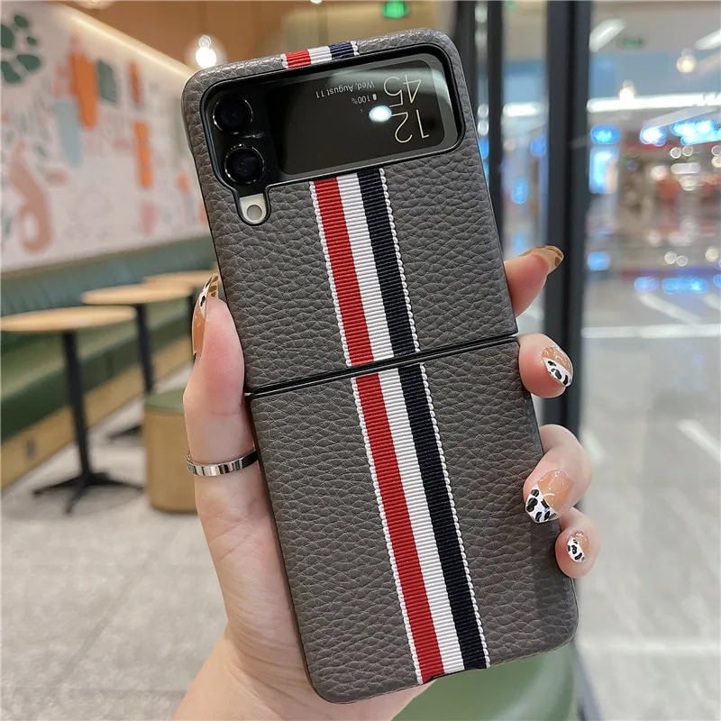 2022 Модный чехол в полоску с зернистой текстурой для Samsung Galaxy Z Flip 4 3 противоударные роскошные кожаные чехлы для Flip 3 Flip3
2022 Модный чехол в полоску с зернистой текстурой для Samsung Galaxy Z Flip 4 3 противоударные роскошные кожаные чехлы для Flip 3 Flip3