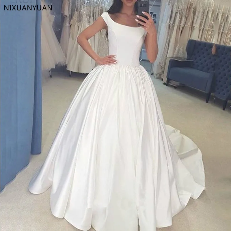 White Ivory Satin Wedding Dresses Cap Sleeves Princess Ball Gown Lace Up Back Bride Dresses Wedding Gowns Robe De Mariee
White Ivory Satin Wedding Dresses Cap Sleeves Princess Ball Gown Lace Up Back Bride Dresses Wedding Gowns Robe De Mariee