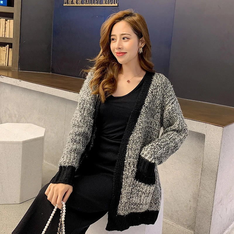 Autumn Winter Loose Personality Sweater New Korean Version of The V-neck Knitted Cardigan Jacket
Autumn Winter Loose Personality Sweater New Korean Version of The V-neck Knitted Cardigan Jacket