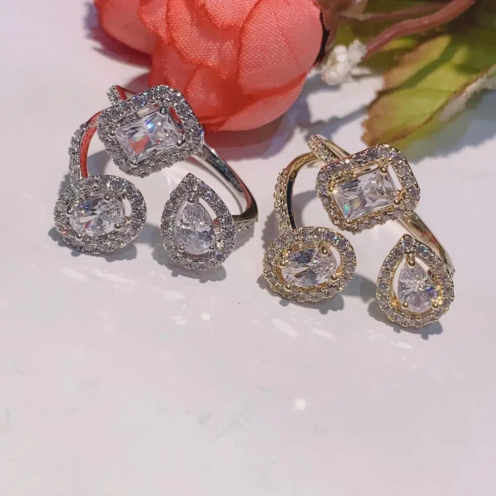 HIBRIDE Beauty Water Shape Clear Cubic Zirconia White Gold-Color Women Open Adjustable Rings for Party Show Bijoux R-251
HIBRIDE Beauty Water Shape Clear Cubic Zirconia White Gold-Color Women Open Adjustable Rings for Party Show Bijoux R-251