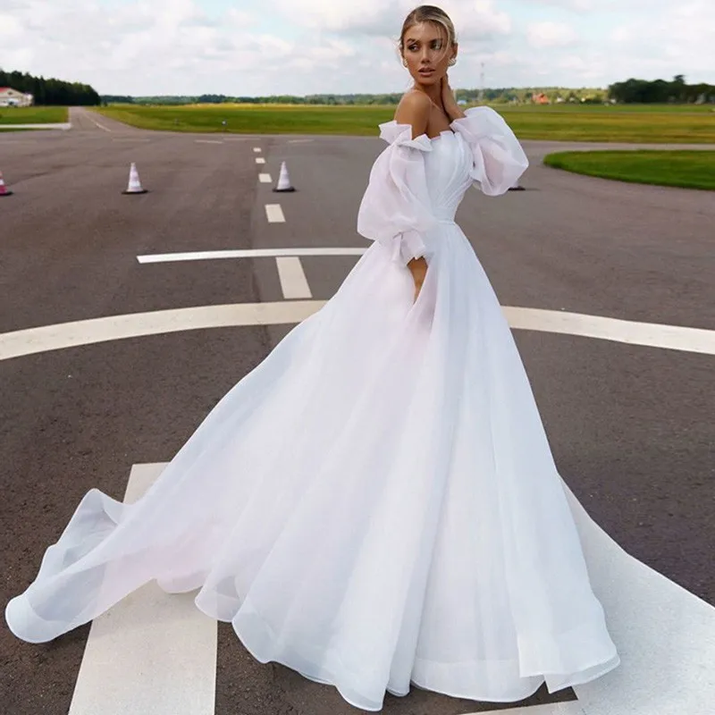 Vestidos 2021 New Pleats Boho Wedding Dresses Sexy Backless Puff Sleeves Beach Bride Gowns Organza Princess Robe De Mariee
Vestidos 2021 New Pleats Boho Wedding Dresses Sexy Backless Puff Sleeves Beach Bride Gowns Organza Princess Robe De Mariee