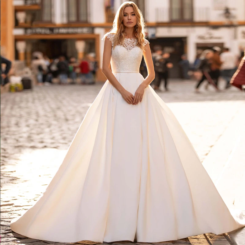 Ensotek Hot Sale Appliques Cap Sleeve Wedding Dress Sexy Illusion Backless Satin Vintage Lace Bride Gowns Vestido De Mariage
Ensotek Hot Sale Appliques Cap Sleeve Wedding Dress Sexy Illusion Backless Satin Vintage Lace Bride Gowns Vestido De Mariage