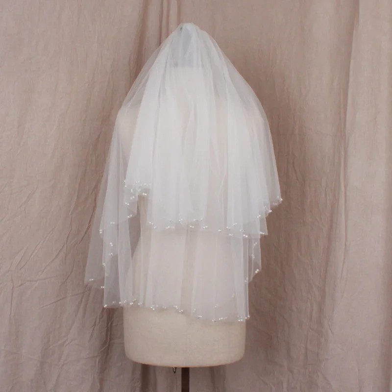 New Arrival Two Layer Bridal veils with comb Pearls Beaded Wedding accessories Sexy Bridal headwear Voile mariage
New Arrival Two Layer Bridal veils with comb Pearls Beaded Wedding accessories Sexy Bridal headwear Voile mariage