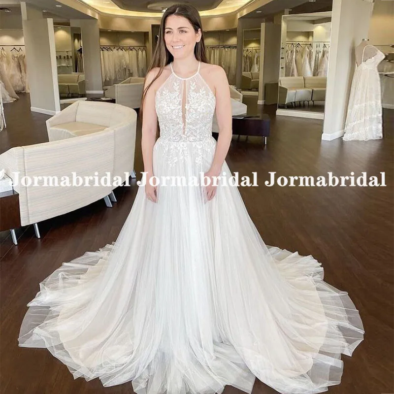 Halter Neck Tulle Wedding Dress With Lace Appliques 2021 New Arrival Sweep Train A-Line Beach Bridal Dresses Robe Sirene
Halter Neck Tulle Wedding Dress With Lace Appliques 2021 New Arrival Sweep Train A-Line Beach Bridal Dresses Robe Sirene