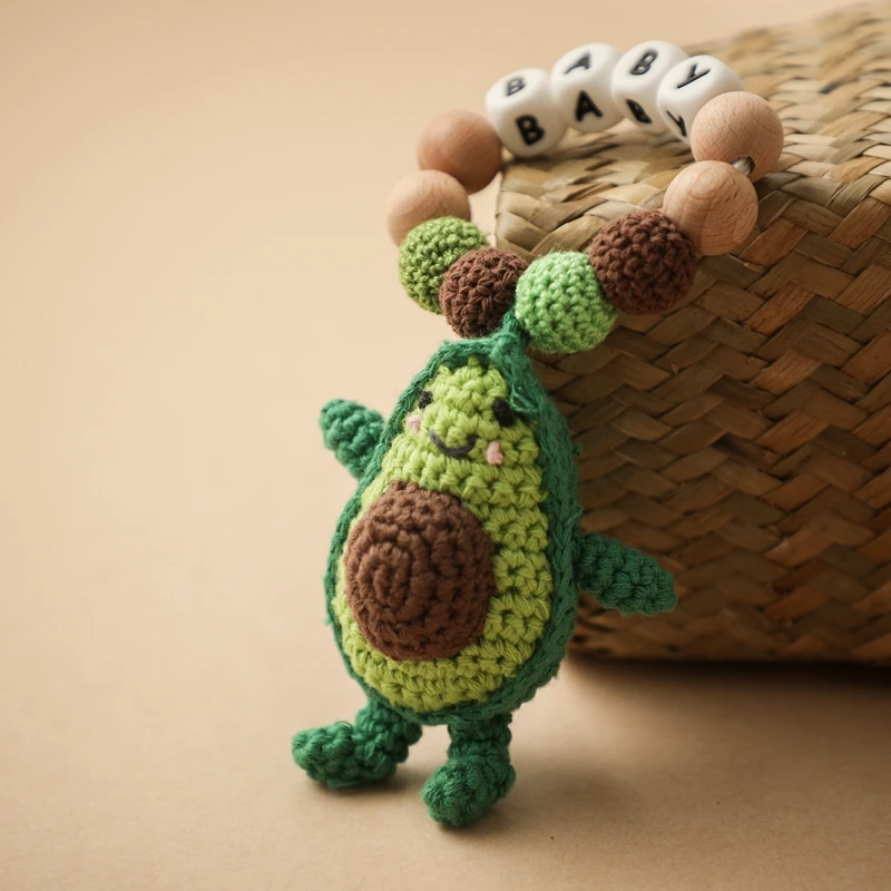 Baby Teething Braclet Name Customized Wooden Silicone Bead Teether Ring Knitted Avocado Pendant Newborn Teething Toy Gift
Baby Teething Braclet Name Customized Wooden Silicone Bead Teether Ring Knitted Avocado Pendant Newborn Teething Toy Gift