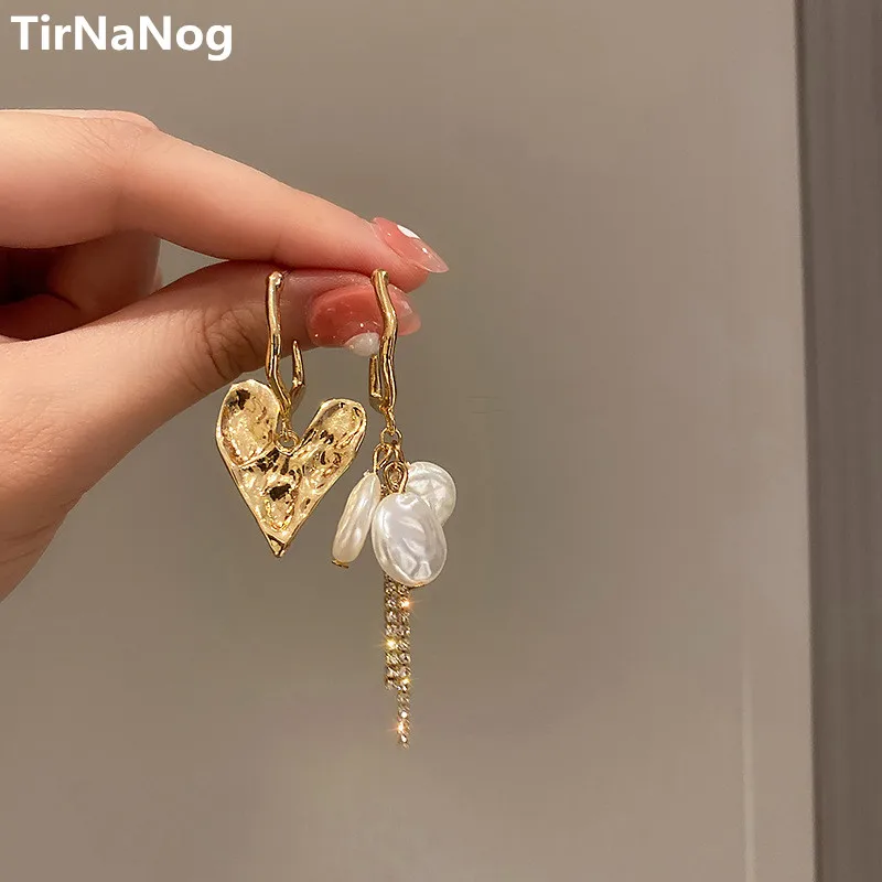 Han Edition Of The New Asymmetric Baroque Imitation Pearl Earrings Contracted Geometric Heart-shaped Earrings Women Jewelry
Han Edition Of The New Asymmetric Baroque Imitation Pearl Earrings Contracted Geometric Heart-shaped Earrings Women Jewelry