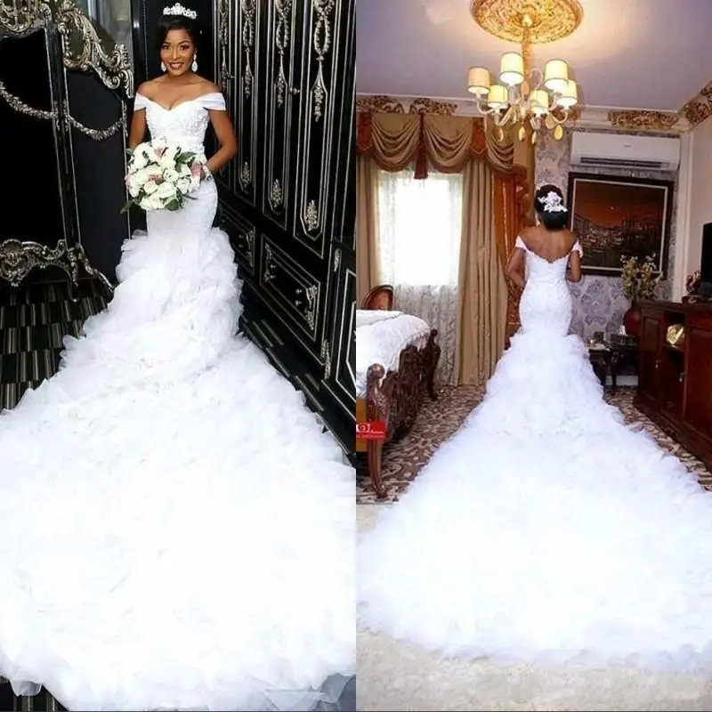 Gorgeous Off-the-Shoulder Lace Wedding Dress 2023 Mermaid Ruffles Corset Sweep Train African Bridal Gowns 
Gorgeous Off-the-Shoulder Lace Wedding Dress 2023 Mermaid Ruffles Corset Sweep Train African Bridal Gowns