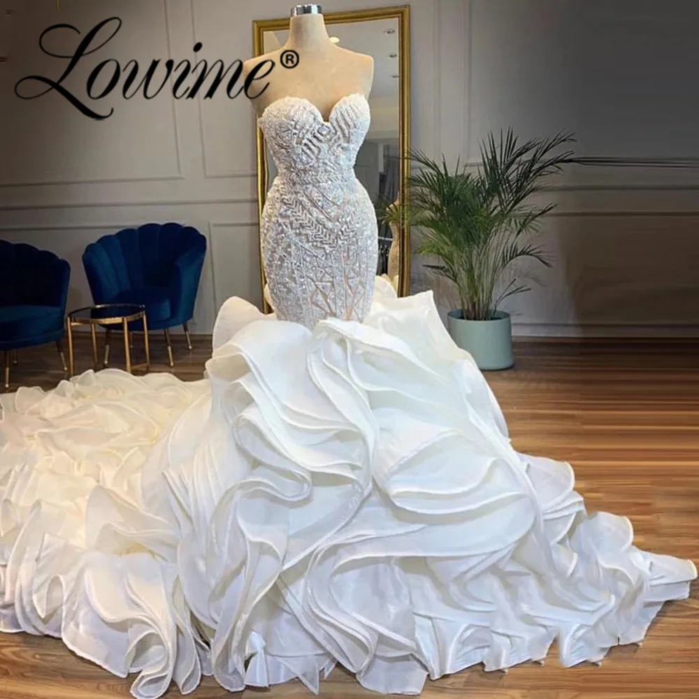 Heavy Beading Mermaid Wedding Dress Long Train Tiered Puffy Organza Ruffles Bridal Gown Plus Size Wedding Gown Dubai Bride Dress
Heavy Beading Mermaid Wedding Dress Long Train Tiered Puffy Organza Ruffles Bridal Gown Plus Size Wedding Gown Dubai Bride Dress