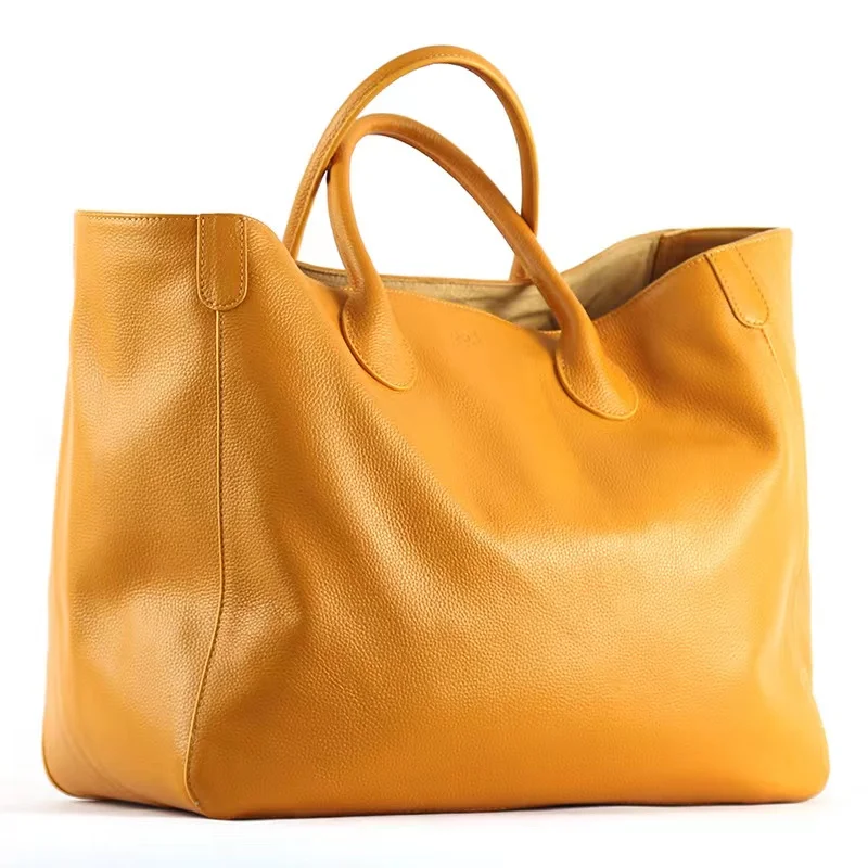 Leather European and American style large-capacity bag New first layer cowhide portable fashion lady bag
Leather European and American style large-capacity bag New first layer cowhide portable fashion lady bag