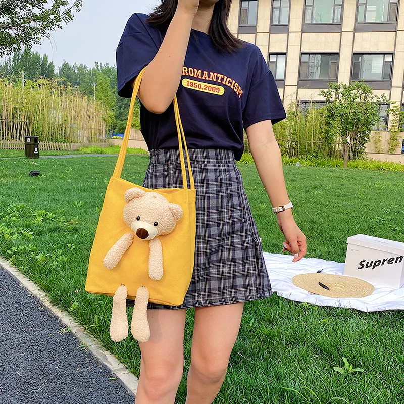 Kawaii fashion bear bag Women's simple messenger bag large capacity one-shoulder canvas bag
Kawaii fashion bear bag Women's simple messenger bag large capacity one-shoulder canvas bag