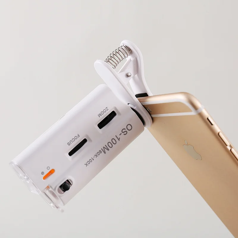 60X -100X Adjustable Mobile Phone Universal Clip Portable Microscope with Led Lamp Uv Lamp Cold and Warm Light Adjustment
60X -100X Adjustable Mobile Phone Universal Clip Portable Microscope with Led Lamp Uv Lamp Cold and Warm Light Adjustment