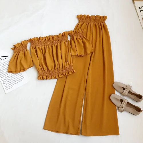 Off Shoulder Short Tops Elastic Waist Wide Leg Long Pants Sexy Two Piece Set Summer Women Casual Solid Color
Off Shoulder Short Tops Elastic Waist Wide Leg Long Pants Sexy Two Piece Set Summer Women Casual Solid Color