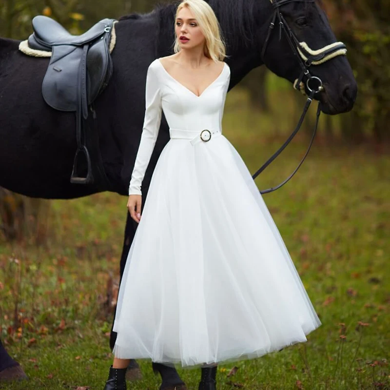 Short Elegant Wedding Dresses Vintage Tea-Length V Neck Long Sleeves Bride Dress Gown Satin Tulle A Line Vestido De Noiva Belt
Short Elegant Wedding Dresses Vintage Tea-Length V Neck Long Sleeves Bride Dress Gown Satin Tulle A Line Vestido De Noiva Belt