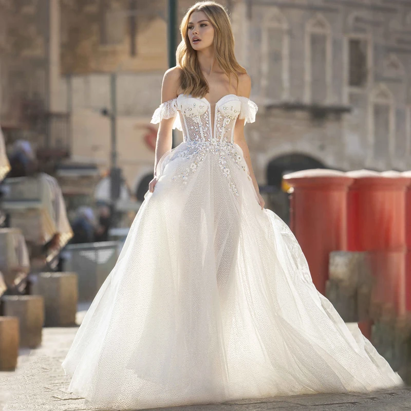 2022 Off Shoulder Sweetheart Appliques See Through Beads A-Line Glitter Tulle Wedding Dress Bridal Gowns Vestido De Noiva
2022 Off Shoulder Sweetheart Appliques See Through Beads A-Line Glitter Tulle Wedding Dress Bridal Gowns Vestido De Noiva