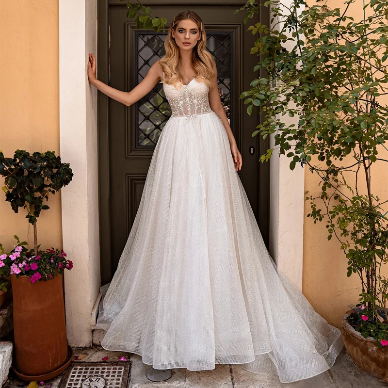 New Design Sweetheart Spaghetti Straps Sequins Beads See Through Top Lace Up Glitter Wedding Dress Bridal Dress with Sweep Train
New Design Sweetheart Spaghetti Straps Sequins Beads See Through Top Lace Up Glitter Wedding Dress Bridal Dress with Sweep Train