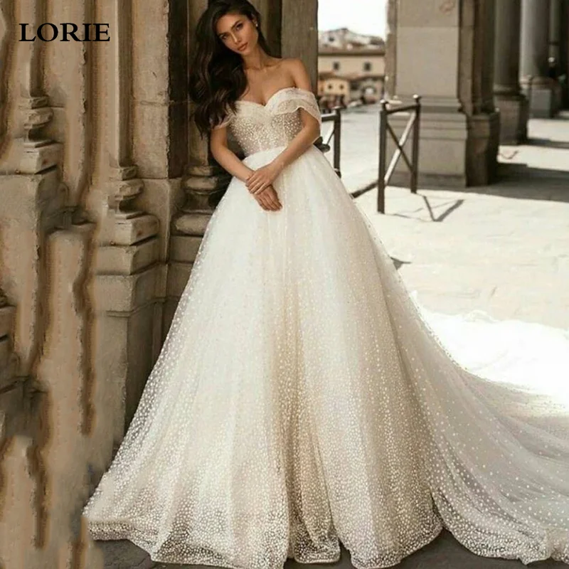 LORIE Boho Wedding Dress 2020 Off the Shoulder Glitter Tulle A-Line Princess Wedding Gowns Bridal Dress vestido de noiva
LORIE Boho Wedding Dress 2020 Off the Shoulder Glitter Tulle A-Line Princess Wedding Gowns Bridal Dress vestido de noiva